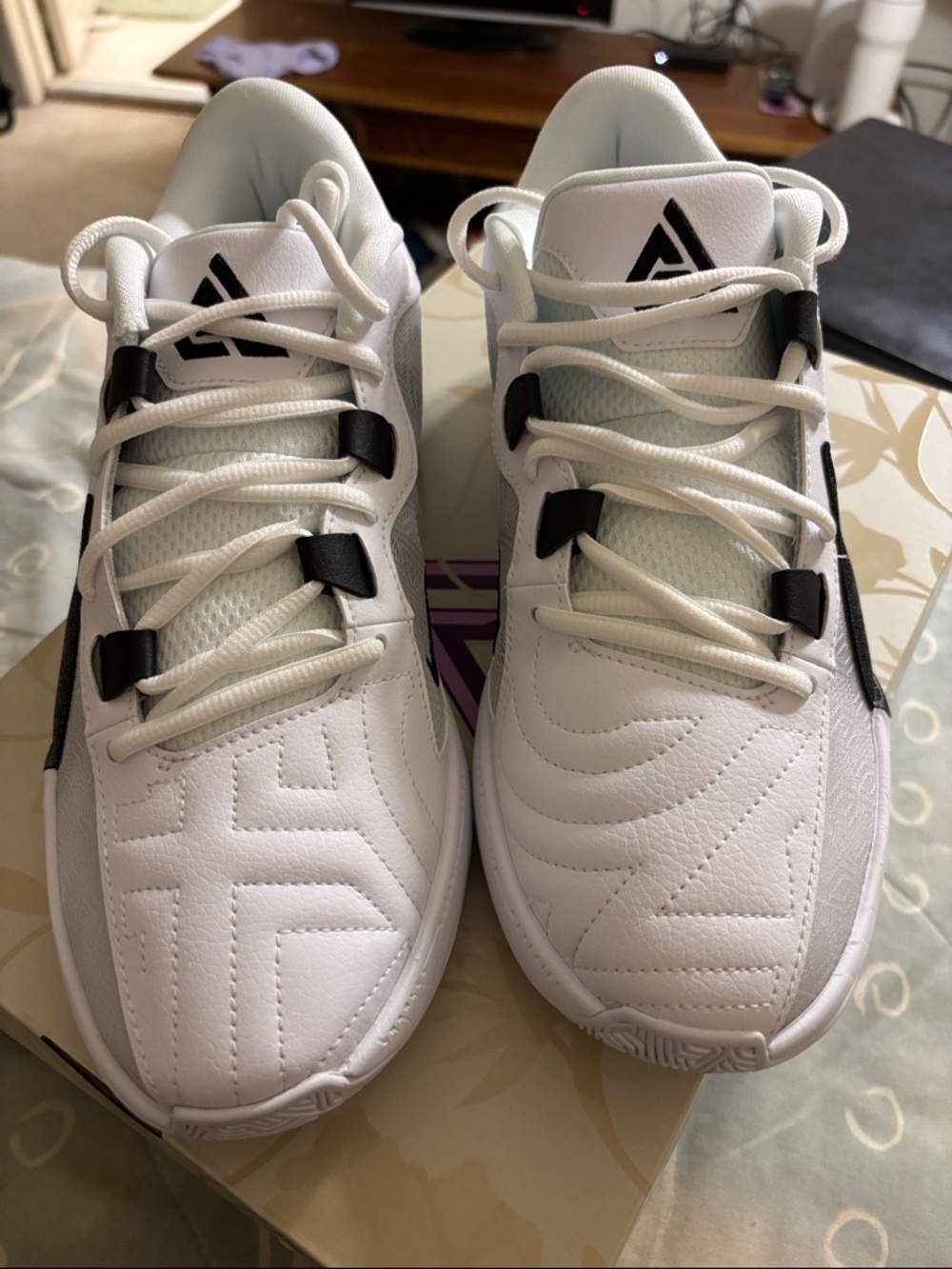 White Athletic Sneakers with Black Accents